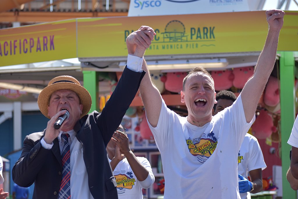 joey chestnut at the world famous taco eating contest on the santa monica pier
