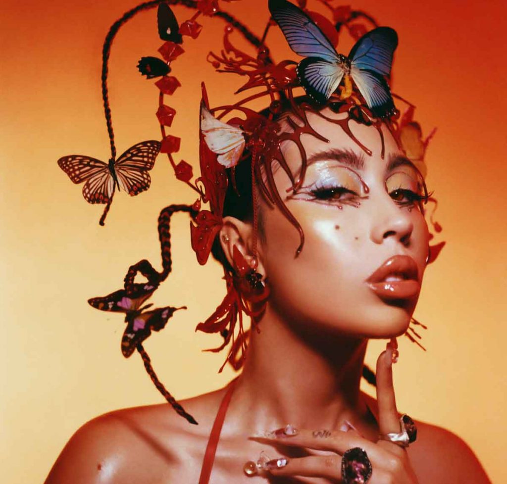 Kali Uchis pictured with butterflies inher hair - artwork from her new albumn Red Moon in Venus | Photo provided by Universal Music Group