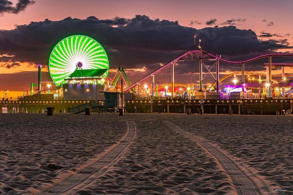 St Patricks Day celebrated at the Santa Monica Pier with the lighting of the Pacific Wheel in bright green colors.