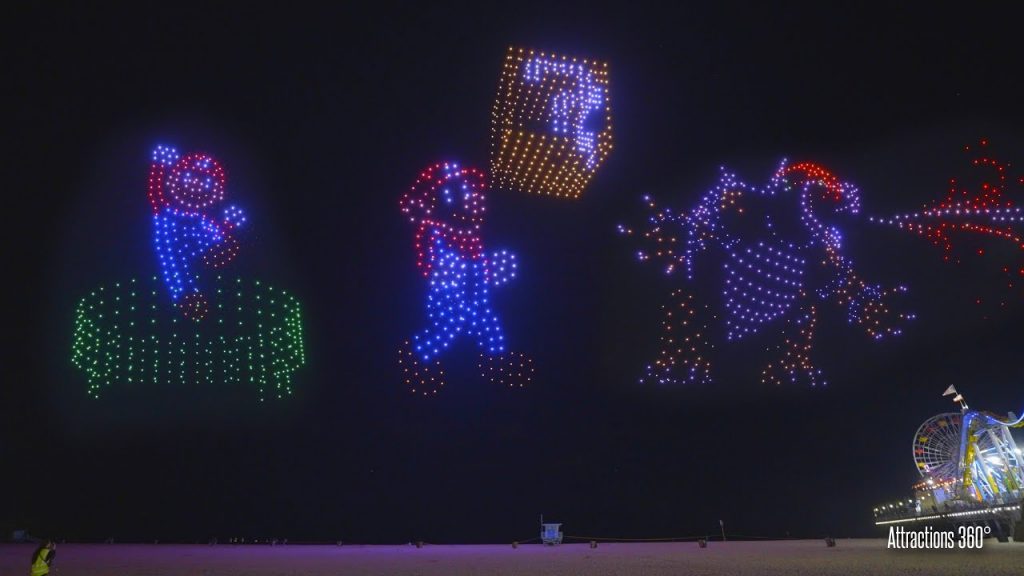 Characters from Nintendo's Super Mario displayed in lights above Santa Monica State Beach