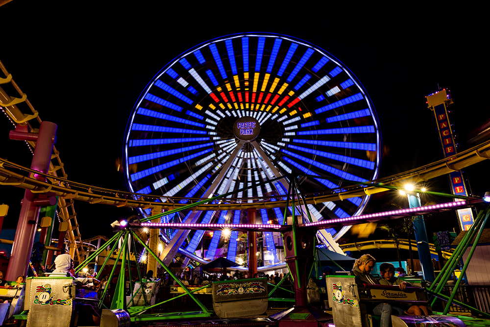 The Jolly Roger from Netflix's live-action adaptation of One Piece depicted on the Pacific Wheel in lights at Pacific Park in California.